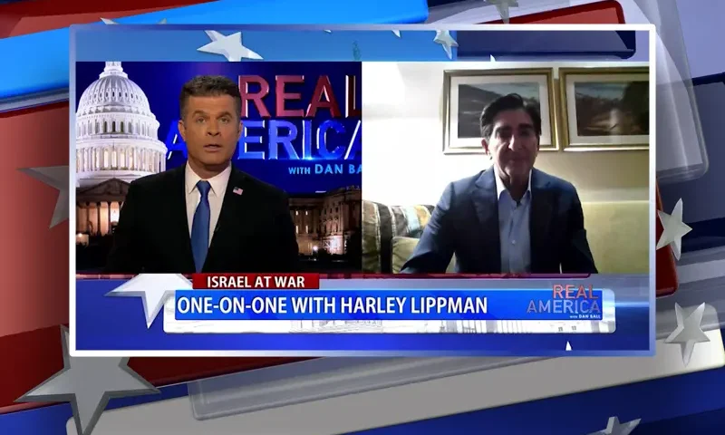 Video still from Real America on One America News Network showing a split screen of the host on the left side, and on the right side is the guest, Harley Lippman.