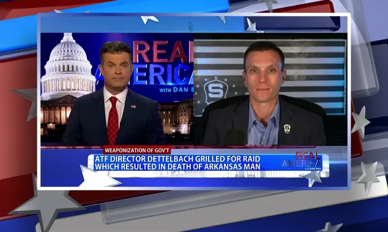 Video still from Real America on One America News Network showing a split screen of the host on the left side, and on the right side is the guest, Steve Friend.