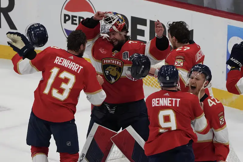 Florida Panthers celebrate winning against the Edmonton Oilers in game seven of the 2024 Stanley Cup Final at Amerant Bank Arena. Mandatory Credit: Jim Rassol-USA TODAY Sports