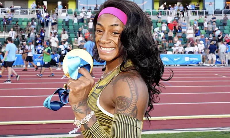 Sha'Carri Richardson poses with gold medal after winning the women's 100m in 10.70 during the US Olympic Team Trials at Hayward Field. Mandatory Credit: Kirby Lee-USA TODAY Sports