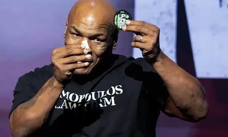 Boxer Mike Tyson promotes one of his energy products during a news conference, ahead of a sanctioned professional fight against Jake Paul which is set to take place at AT&T Stadium in Arlington, Texas on July 20, in New York City, U.S., May 13, 2024. REUTERS/David 'Dee' Delgado