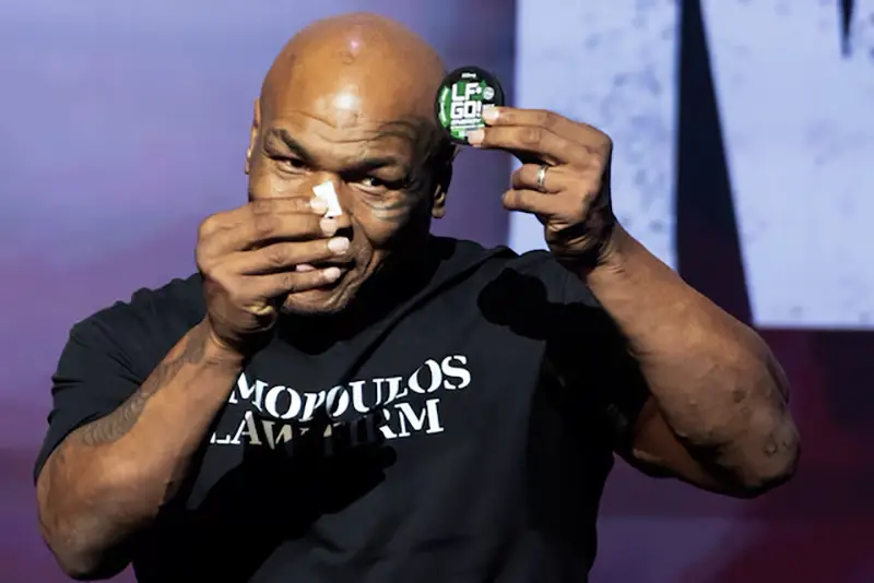 Boxer Mike Tyson promotes one of his energy products during a news conference, ahead of a sanctioned professional fight against Jake Paul which is set to take place at AT&T Stadium in Arlington, Texas on July 20, in New York City, U.S., May 13, 2024. REUTERS/David 'Dee' Delgado