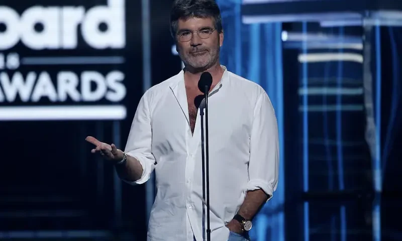 Simon Cowell speaks on stage. REUTERS/Mario Anzuoni