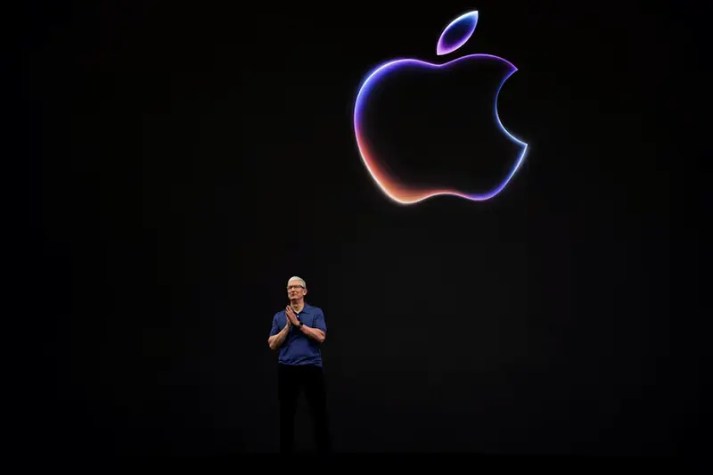 Apple CEO Tim Cook attends the annual developer conference event at the company's headquarters in Cupertino, California, U.S., June 10, 2024. REUTERS/Carlos Barria/File Photo
