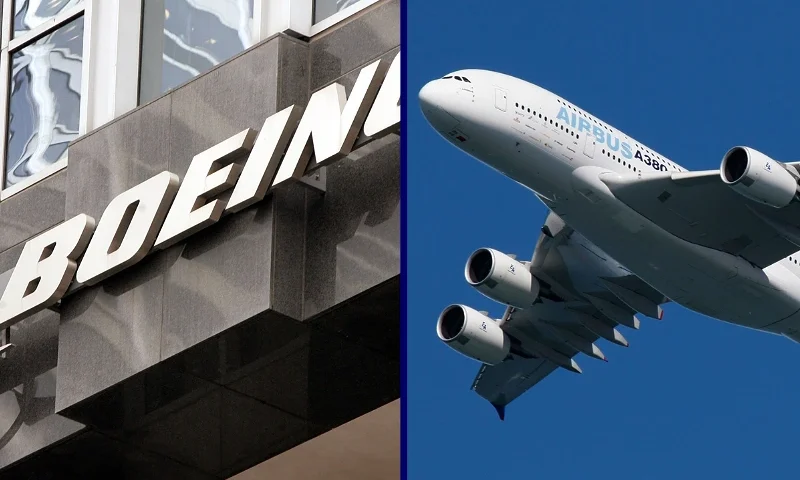 (L) CHICAGO - NOVEMBER 28: The Boeing logo hangs on the corporate world headquarters building of Boeing November 28, 2006 in Chicago, Illinois. Orders for U.S. manufactured durable goods saw an 8.3 percent decrease in October. Aircraft orders dropped 45 percent for the same period. (Photo by Scott Olson/Getty Images) / (R) SAN FRANCISCO - OCTOBER 5: The Airbus A380 flies over San Francisco as part of the city's Fleet Week October 5, 2007 in San Francisco, California. The A380, the world's largest commercial aircraft, was in town this week to test facilities at San Francisco International Airport as well as be part of San Francisco's annual Fleet Week (Photo by Justin Sullivan/Getty Images)