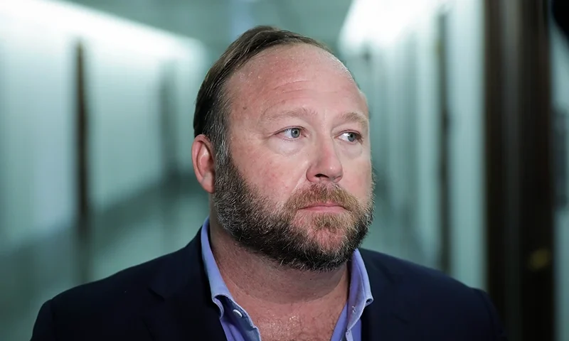 WASHINGTON, DC - SEPTEMBER 5: Alex Jones of InfoWars talks to reporters outside a Senate Intelligence Committee hearing concerning foreign influence operations' use of social media platforms, on Capitol Hill, September 5, 2018 in Washington, DC. Twitter CEO Jack Dorsey and Facebook chief operating officer Sheryl Sandberg faced questions about how foreign operatives use their platforms in attempts to influence and manipulate public opinion. (Photo by Drew Angerer/Getty Images)
