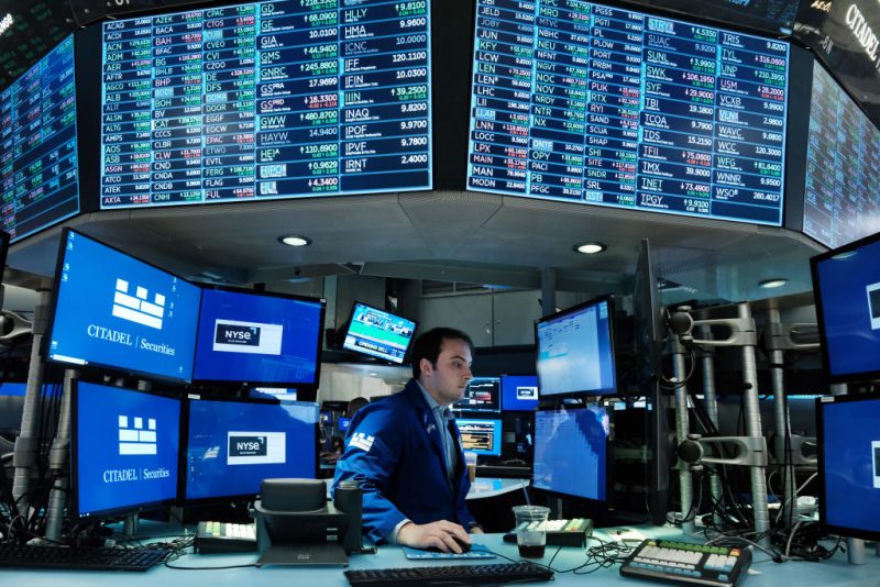 NEW YORK, NEW YORK - JUNE 14: Traders work on the floor of the New York Stock Exchange (NYSE) on June 14, 2022 in New York City. The Dow was up in morning trading following a drop on Monday of over 800 points, which sent the market into bear territory as fears of a possible recession loom. (Photo by Spencer Platt/Getty Images)