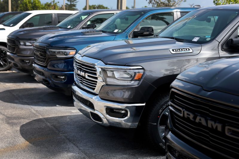 MIAMI, FLORIDA - OCTOBER 03: New Ram vehicles sit on a Dodge Chrysler-Jeep Ram dealership's lot on October 03, 2023 in Miami, Florida. U.S. automakers show a rise in sales in the third quarter even with the ongoing United Auto Workers’ union labor strikes at GM, Ford, and Chrysler-parent Stellantis and higher interest rates. (Photo by Joe Raedle/Getty Images)