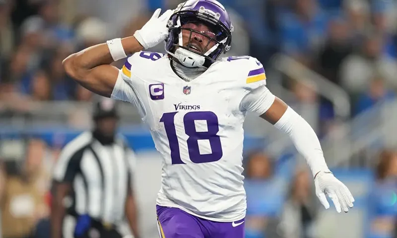 Justin Jefferson #18 of the Minnesota Vikings celebrates after a touchdown during the third quarter in the game against the Detroit Lions at Ford Field on January 07, 2024 in Detroit, Michigan. (Photo by Nic Antaya/Getty Images)
