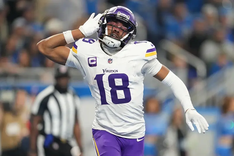 Justin Jefferson #18 of the Minnesota Vikings celebrates after a touchdown during the third quarter in the game against the Detroit Lions at Ford Field on January 07, 2024 in Detroit, Michigan. (Photo by Nic Antaya/Getty Images)