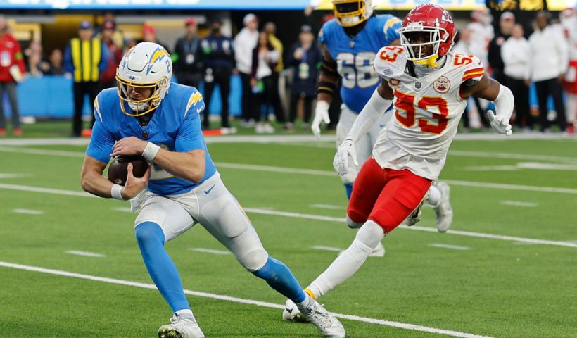 INGLEWOOD, CALIFORNIA - JANUARY 07: Easton Stick #2 of the Los Angeles Chargers runs the ball in the fourth quarter during a game against the Kansas City Chiefs at SoFi Stadium on January 07, 2024 in Inglewood, California. (Photo by Kevork Djansezian/Getty Images)