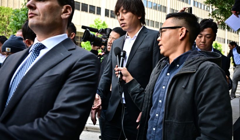Ippei Mizuhara departs federal court after his arraignment in Los Angeles, California, on May 14, 2024. Shohei Ohtani's former interpreter, Mizuhara, has agreed to plead guilty over charges of illegally transferring nearly $17 million from the baseball star's bank account in order to pay off gambling debts. (Photo by Frederic J. Brown / AFP) (Photo by FREDERIC J. BROWN/AFP via Getty Images)