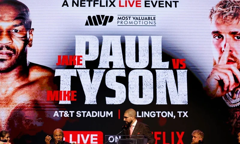 NEW YORK, NEW YORK - MAY 13: (L-R) Katie Taylor, Mike Tyson, Ariel Helwani, Jake Paul, and Amanda Serrano speak onstage at the press conference in promotion for the upcoming Jake Paul vs. Mike Tyson boxing match at The Apollo Theater on May 13, 2024 in New York City. (Photo by Sarah Stier/Getty Images for Netflix)