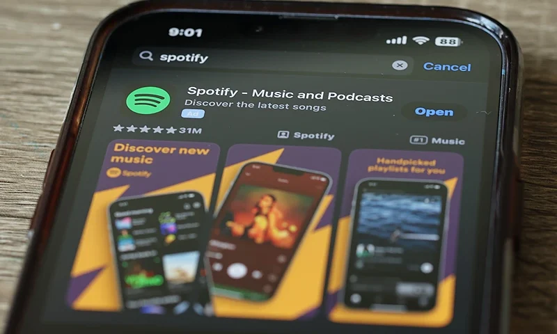 NEW YORK, NEW YORK - JUNE 04: In this photo illustration, the Spotify music app is seen on a phone on June 04, 2024 in New York City. Spotify made an announcement that it will be raising the price of its Spotify Premium Individual plan by $1, from $10.99 to $11.99 per month and the Premium Family plan by $3, from $16.99 to $19.99 per month. (Photo Illustration by Michael M. Santiago/Getty Images)