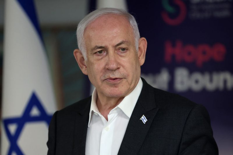 RAMAT GAN, ISRAEL - JUNE 8: Israeli Prime Minister Benjamin Netanyahu speaks during a press conference at the Sheba Tel-HaShomer Medical Centre on June 8, 2024 in Ramat Gan, Israel. Earlier today, the country's military announced the rescue of four hostages kidnapped by Palestinian militants on Oct. 7 - Noa Argamani, Almog Meir Jan, Andrey Kozlov and Shlomi Ziv - and since held in Gaza. Around 120 other Israeli hostages are said to remain in Gaza, but it's unclear how many are alive. (Photo by Jack Guez -Pool/Getty Images)