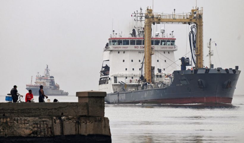 The fleet oil tanker Pashin (R) and the rescue and tugboat Nicolay Chiker (L), part of the Russian naval detachment visiting Cuba, arrives at Havana's harbour, June 12, 2024. The Russian nuclear-powered submarine Kazan -- which will not be carrying nuclear weapons -- and three other Russian naval vessels, will dock in the Cuban capital from June 12-17. The unusual deployment of the Russian military so close to the United States -- particularly the powerful submarine -- comes amid major tensions over the war in Ukraine, where the Western-backed government is fighting a Russian invasion. (Photo by YAMIL LAGE / AFP) (Photo by YAMIL LAGE/AFP via Getty Images)