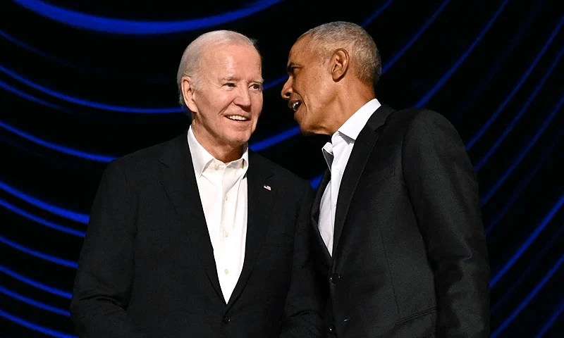 US President Joe Biden (L) stands with former US President Barack Obama onstage during a campaign fundraiser at the Peacock Theater in Los Angeles on June 15, 2024. (Photo by Mandel NGAN / AFP) (Photo by MANDEL NGAN/AFP via Getty Images)