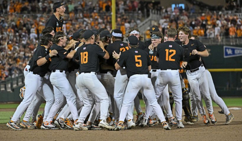 OMAHA, NE - JUNE 24: The Tennessee Volunteers celebrate after defeating the Texas A&M Aggies to win the National Championship at the NCAA Division I Baseball Championship on June 24, 2024 at Charles Schwab Field in Omaha, Nebraska. (Photo by Peter Aiken/Getty Images)