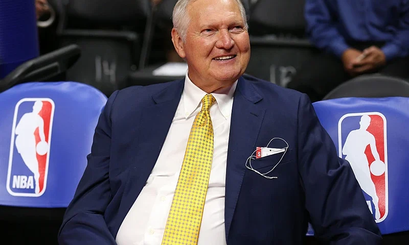 LOS ANGELES, CA - MARCH 31: Golden State Warriors executive board member Jerry West sits on the bench by NBA logos before the game the Los Angeles Clippers at Staples Center on March 31, 2015 in Los Angeles, California. NOTE TO USER: User expressly acknowledges and agrees that, by downloading and or using this photograph, User is consenting to the terms and conditions of the Getty Images License Agreement. (Photo by Stephen Dunn/Getty Images)