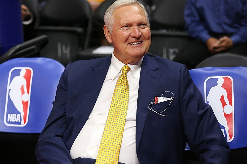 LOS ANGELES, CA - MARCH 31: Golden State Warriors executive board member Jerry West sits on the bench by NBA logos before the game the Los Angeles Clippers at Staples Center on March 31, 2015 in Los Angeles, California. NOTE TO USER: User expressly acknowledges and agrees that, by downloading and or using this photograph, User is consenting to the terms and conditions of the Getty Images License Agreement. (Photo by Stephen Dunn/Getty Images)