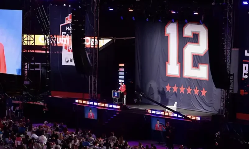 Former quarterback Tom Brady speaks during his New England Patriots Hall of Fame induction ceremony at Gillette Stadium. Mandatory Credit: Eric Canha-USA TODAY Sports