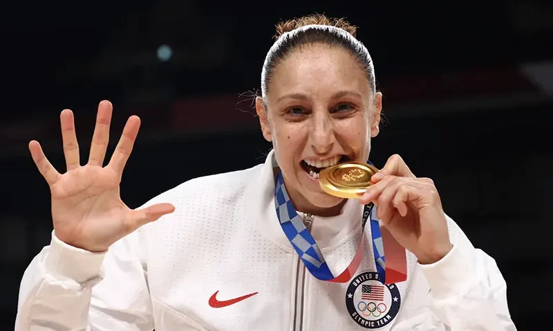 Diana Taurasi of the United States poses with her gold medal during the medal ceremony REUTERS/Brian Snyder/File Photo