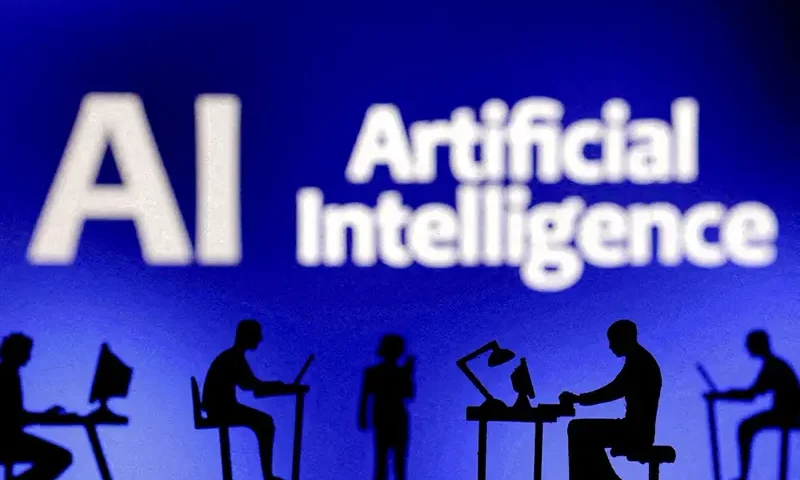 Figurines with computers and smartphones are seen in front of the words "Artificial Intelligence AI" in this illustration taken, February 19, 2024. REUTERS/Dado Ruvic/Illustration/File Photo