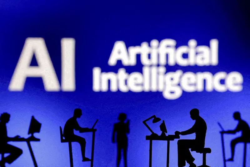 Figurines with computers and smartphones are seen in front of the words "Artificial Intelligence AI" in this illustration taken, February 19, 2024. REUTERS/Dado Ruvic/Illustration/File Photo