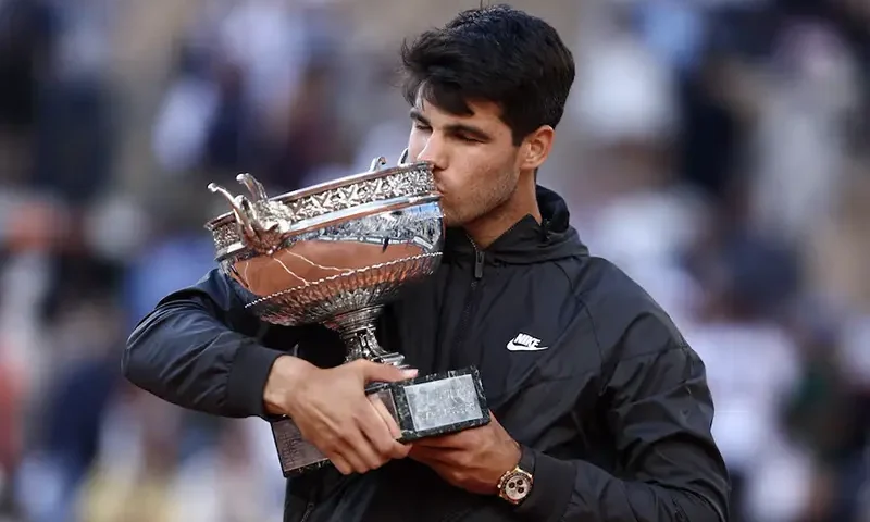 Spain's Carlos Alcaraz celebrates with the trophy after winning the men's singles final against Germany's Alexander Zverev REUTERS/Stephanie Lecocq
