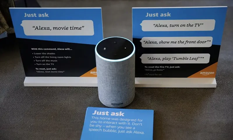 Prompts on how to use Amazon's Alexa personal assistant are seen alongside an Amazon Echo in an Amazon ?experience center? in Vallejo, California, U.S., May 8, 2018. Picture taken on May 8, 2018. REUTERS/Elijah Nouvelage/File Photo