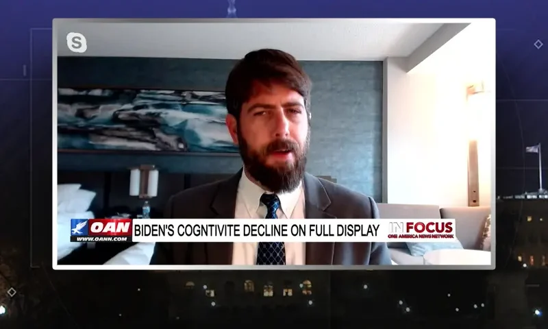 Video still from In Focus on One America News Network during an interview with the guest, Alex Newman.