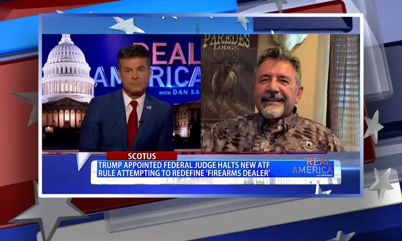 Video still from Real America on One America News Network showing a split screen of the host on the left side, and on the right side is the guest, Sam Paredes.