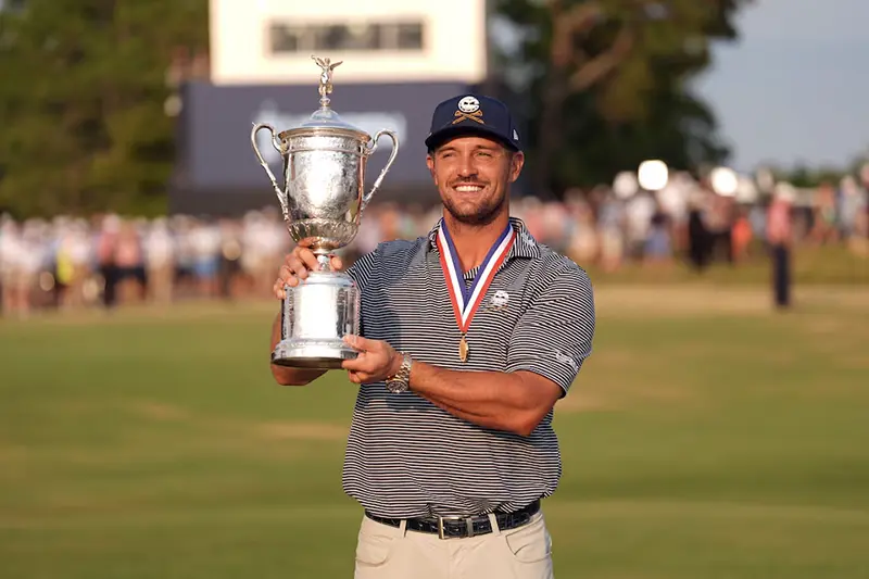 Bryson DeChambeau celebrates with the trophy after winning the U.S. Open golf tournament. Jim Dedmon-USA TODAY Sports