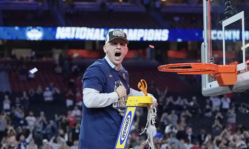 Connecticut Huskies head coach Dan Hurley celebrates after winning the national championship game of the Final Four of the 2024 NCAA Tournament against the Purdue Boilermakers at State Farm Stadium. Mandatory Credit: Bob Donnan-USA TODAY Sports