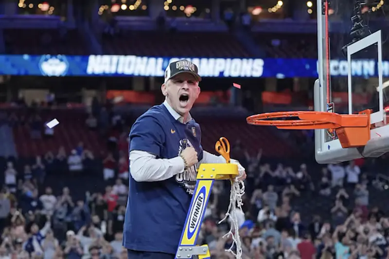 Connecticut Huskies head coach Dan Hurley celebrates after winning the national championship game of the Final Four of the 2024 NCAA Tournament against the Purdue Boilermakers at State Farm Stadium. Mandatory Credit: Bob Donnan-USA TODAY Sports