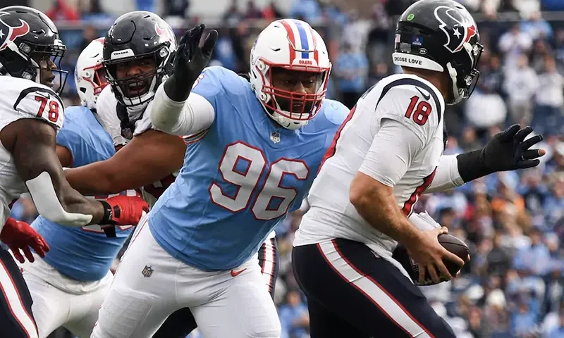 Houston Texans quarterback Case Keenum (18) is sacked by Tennessee Titans defensive end Denico Autry (96) during the second half at Nissan Stadium. Mandatory Credit: Christopher Hanewinckel-USA TODAY Sports/File Photo