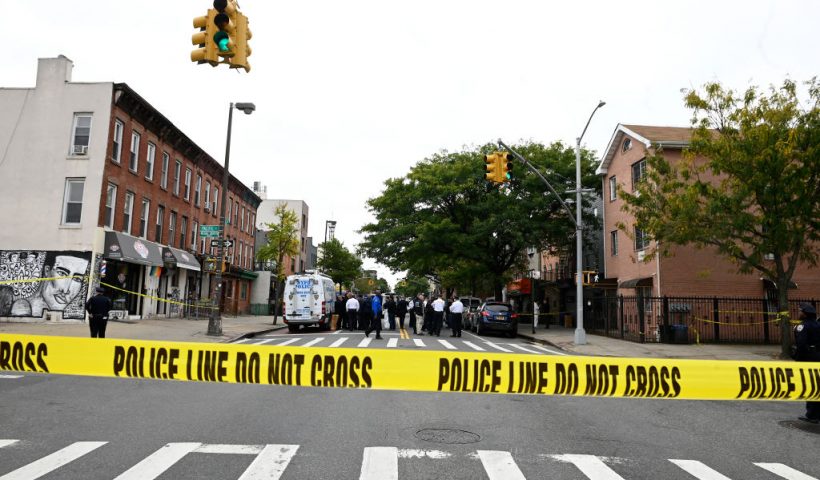 Police tape secures a crime scene outside a club after a shooting in Brooklyn on October 12, 2019. At least four people died and three were wounded in a shooting at a social club in New York eary Saturday, police said. No one has been arrested over the shooting, which took place in Brooklyn, and the motive and exact circumstances are not known, a New York police official told AFP. The local affiliate of ABC News described the place where the shooting took place as an after-hours club. (Photo by Johannes EISELE / AFP) (Photo by JOHANNES EISELE/AFP via Getty Images)