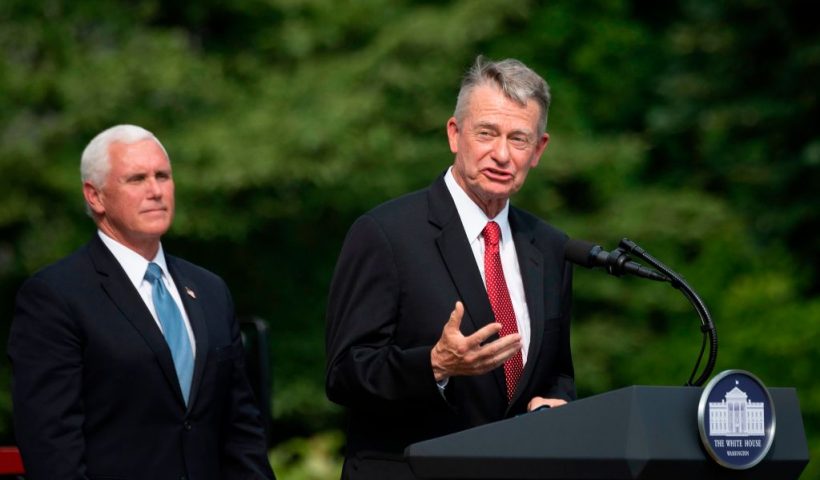 US Vice President President Mike Pence(L) listens as Idaho Governor Brad Little(R-ID) speaks at the White House in Washington, DC, on July 16, 2020, during an event on Rolling Back Regulations to Help All Americans on the South Lawn at the White House on July 16, 2020 in Washington,DC. (Photo by JIM WATSON / AFP) (Photo by JIM WATSON/AFP via Getty Images)