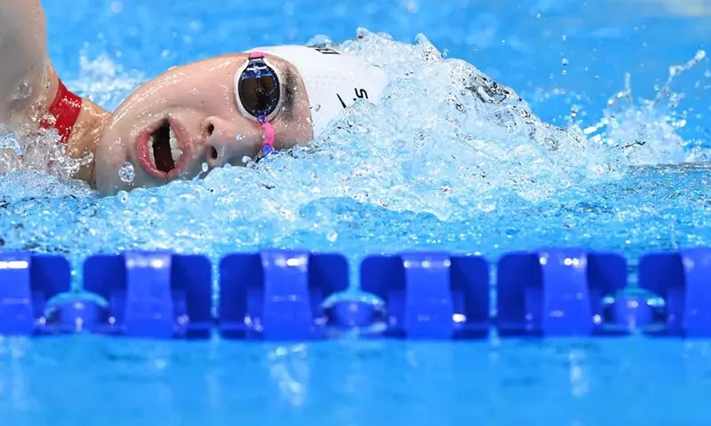 China's Li Bingjie competes in the final of the women's 4x200m freestyle relay swimming event during the Tokyo 2020 Olympic Games at the Tokyo Aquatics Centre in Tokyo on July 29, 2021. (Photo by Attila KISBENEDEK / AFP) (Photo by ATTILA KISBENEDEK/AFP via Getty Images)