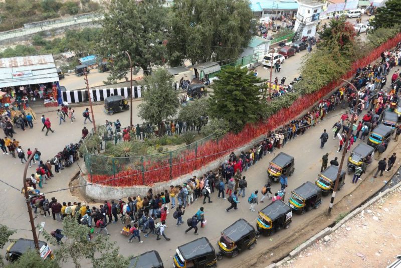Devotees stand in a queue along the path to visit the Vaishno Devi shrine, one of the country's most revered Hindu sites, hours after a deadly stampede at the shrine, in Katra on January 1, 2022. - At least 12 people died and 13 were injured in a stampede at a religious shrine in India in the early hours of January 1 as thousands of pilgrims massed to offer prayers, officials said. (Photo by AFP) (Photo by -/AFP via Getty Images)