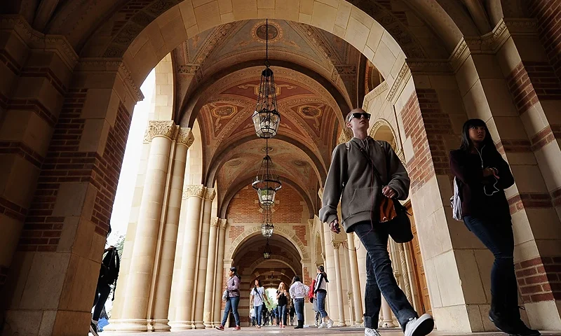LOS ANGELES, CA - APRIL 23: Students walk near Royce Hall on the campus of UCLA on April 23, 2012 in Los Angeles, California. According to reports, half of recent college graduates with bachelor's degrees are finding themselves underemployed or jobless. (Photo by Kevork Djansezian/Getty Images)