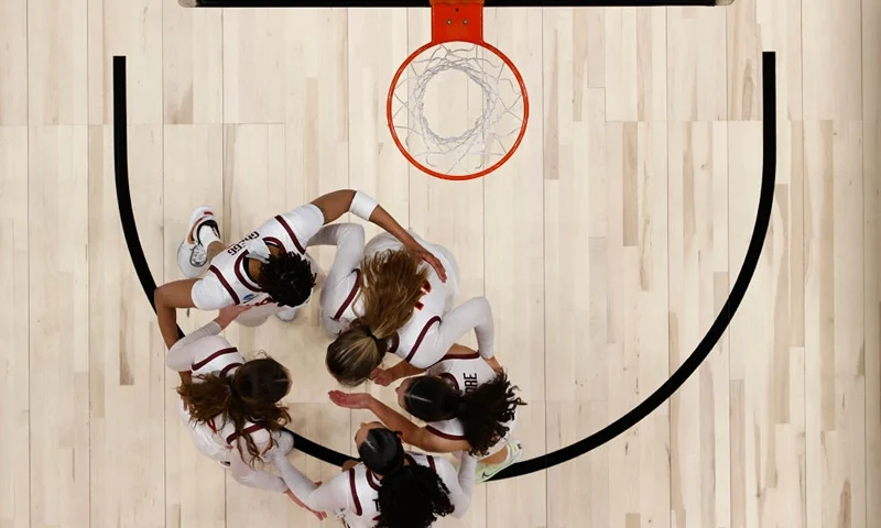 SEATTLE, WASHINGTON - MARCH 25: The Virginia Tech Hokies huddle prior to the game against the Tennessee Lady Vols in the Sweet Sixteen round of the NCAA Women's Basketball Tournament at Climate Pledge Arena on March 25, 2023 in Seattle, Washington. (Photo by Steph Chambers/Getty Images)