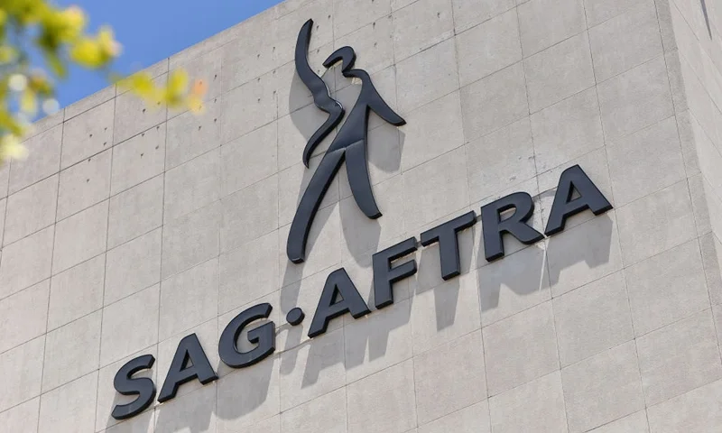 TOPSHOT - The SAG-AFTRA building, home to the US labor union that represents film and television actors, singers, and other performers, is seen in Los Angeles, California, on July 13, 2023. Tens of thousands of Hollywood actors will go on strike at midnight Thursday, effectively bringing the giant movie and television business to a halt as they join writers in the first industry-wide walkout for 63 years. The Screen Actors Guild (SAG-AFTRA) issued a strike order after last-ditch talks with studios on their demands over dwindling pay and the threat posed by artificial intelligence ended without a deal. (Photo by Chris Delmas / AFP) (Photo by CHRIS DELMAS/AFP via Getty Images)