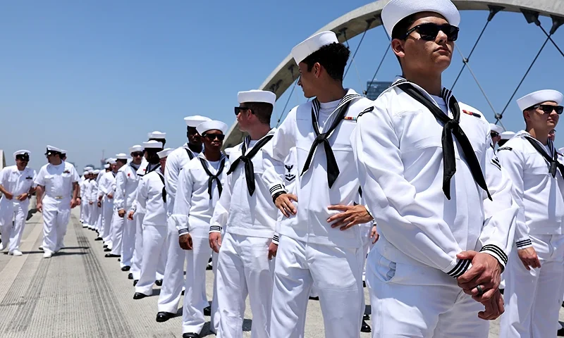 LOS ANGELES, CALIFORNIA - MAY 27: U.S. Navy sailors from the USS Carl Vinson prepare to march across the iconic 6th Street Viaduct for a Memorial Day salute on May 27, 2024 in Los Angeles, California. The U.S. celebrates Memorial Day each year to honor those who have died while serving in the Armed Forces. (Photo by Mario Tama/Getty Images)