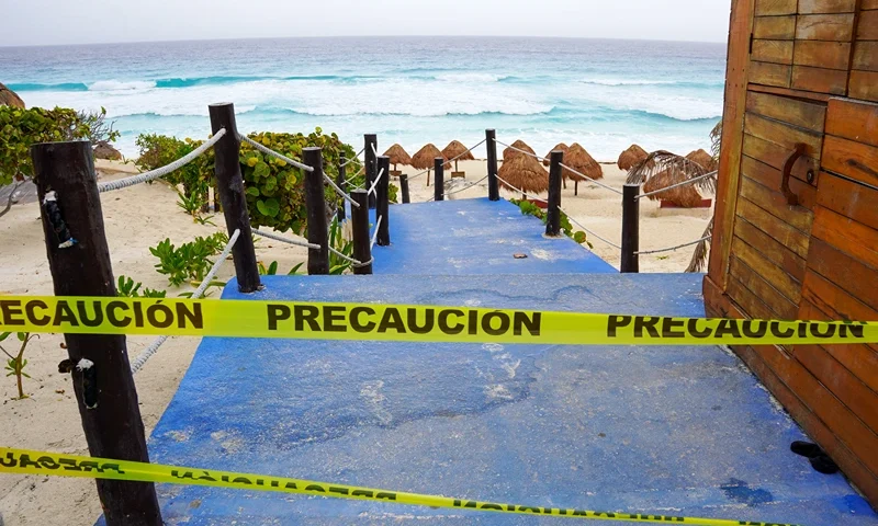 MEXICO-WEATHER-HURRICANE-BERYL Access to a beach remains closed ahead of Hurricane Beryl's arrival in Cancun, Quintana Roo State, Mexico, on July 4, 2024. Tourist resorts in Mexico's Yucatan Peninsula girded Thursday for a hit from Hurricane Beryl, which is still packing ferocious winds after slamming Jamaica and the Cayman Islands. (Photo by Elizabeth Ruiz / AFP) (Photo by ELIZABETH RUIZ/AFP via Getty Images)