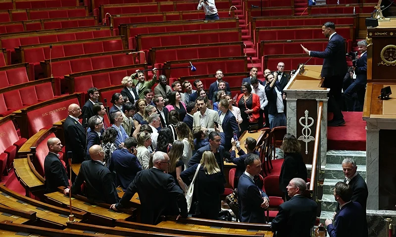 French newly-elected Member of Parliament (MP) for the La France Insoumise (LFI) party of the leftist coalition "Nouveau Front Populaire" (New Popular Front - NFP) Sebastien Delogu (R) speaks to newly-elected Members of Parliament (MP) gathered at France's National Assembly in Paris on July 9, 2024, following the second round of France's legislative election. (Photo by ALAIN JOCARD / AFP) (Photo by ALAIN JOCARD/AFP via Getty Images)