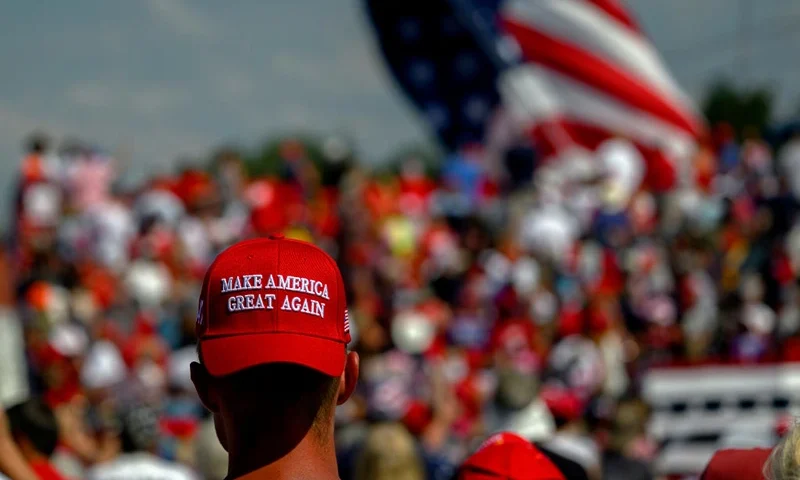 BUTLER, PENNSYLVANIA - JULY 13: Supporters of Republican presidential candidate, former U.S President Donald Trump wait for the start of a campaign rally at Butler Farm Show Inc. on July 13, 2024 in Butler, Pennsylvania. Shortly after Trump began to speak, shots rang out and the former president slumped before being whisked away by Secret Service with injuries visible to the side of his head. Butler County district attorney Richard Goldinger said that the shooter and one audience member are dead and another was injured. (Photo by Jeff Swensen/Getty Images)