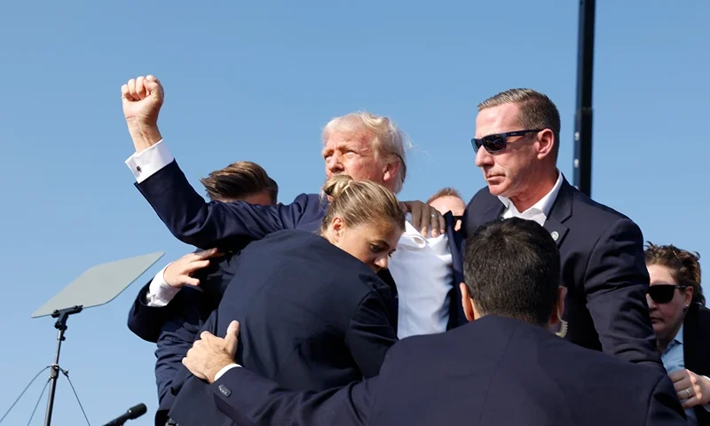 Donald Trump Holds A Campaign Rally In Butler, Pennsylvania BUTLER, PENNSYLVANIA - JULY 13: Republican presidential candidate former President Donald Trump is rushed offstage during a rally on July 13, 2024 in Butler, Pennsylvania. (Photo by Anna Moneymaker/Getty Images)