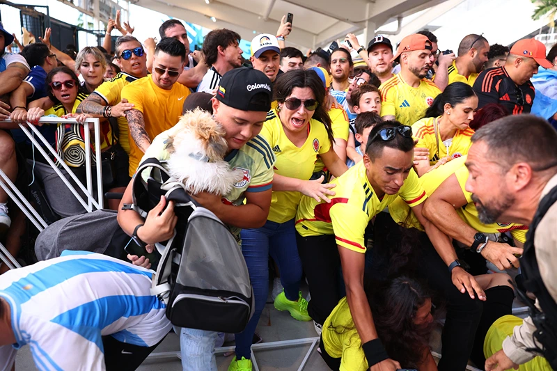 Argentina v Colombia - CONMEBOL Copa America USA 2024: Final
MIAMI GARDENS, FLORIDA - JULY 14: Fans try to enter the stadium amid disturbances prior to the CONMEBOL Copa America 2024 Final match between Argentina and Colombia at Hard Rock Stadium on July 14, 2024 in Miami Gardens, Florida. (Photo by Maddie Meyer/Getty Images)