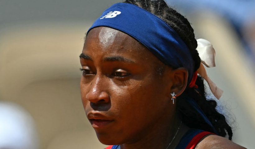 US' Coco Gauff reacts after a call goes against her while playing Croatia's Donna Vekic during their women's singles third round tennis match on Court Philippe-Chatrier at the Roland-Garros Stadium during the Paris 2024 Olympic Games, in Paris on July 30, 2024. (Photo by PATRICIA DE MELO MOREIRA / AFP) (Photo by PATRICIA DE MELO MOREIRA/AFP via Getty Images)